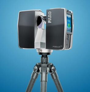 A photo of a Faro Focus 3D scanner on a blue studio background.